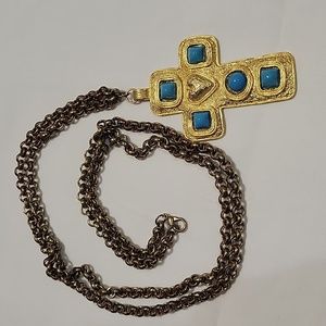 Long goldtone necklace with cross